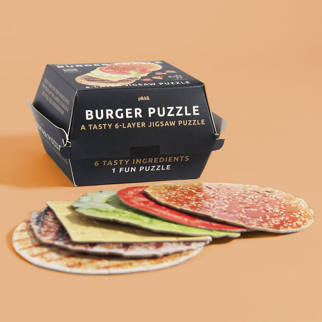 Burger 6 Layer Jigsaw Puzzle by Pikkii - Layers Stacked in Front of Packaging on Orange Background