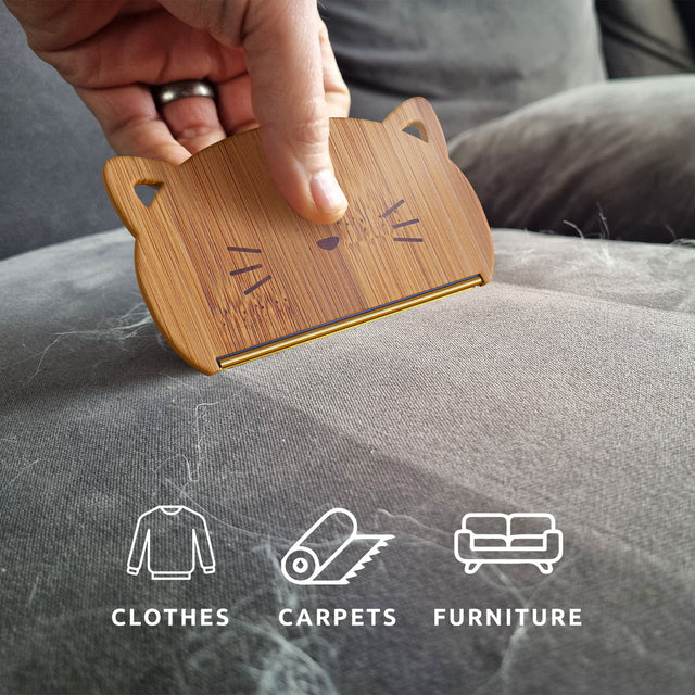 Sustainable bamboo Cat Hair Remover by Pikkii cleaning sofa with icons overlay - suitable for use on clothes, carpets and furniture