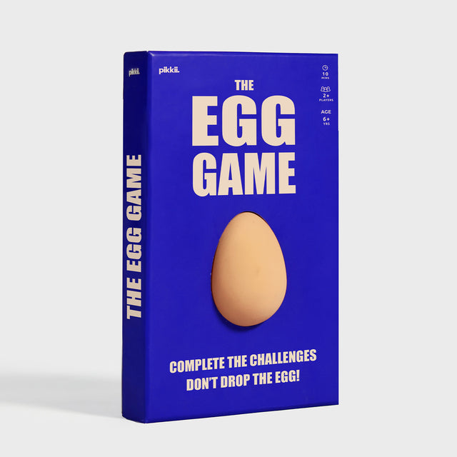 The Egg Game by Pikkii Front of Packaging on Grey Background