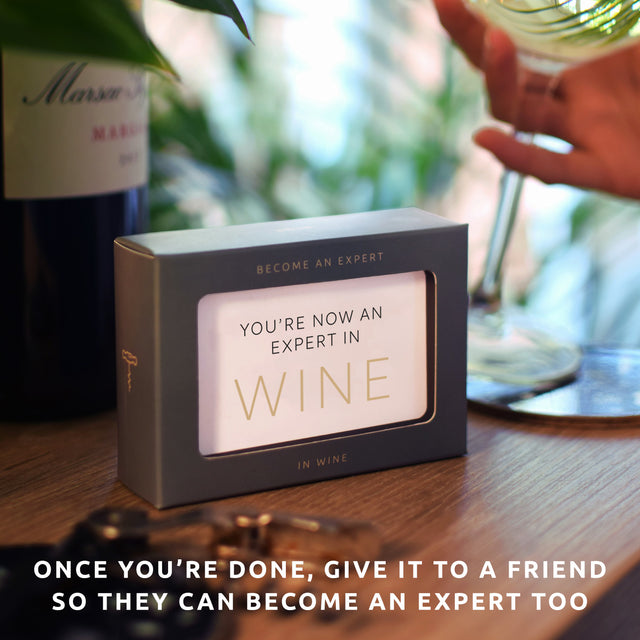 Become an expert in wine in 90 days slide box by Pikkii on countertop - end of the 90 days