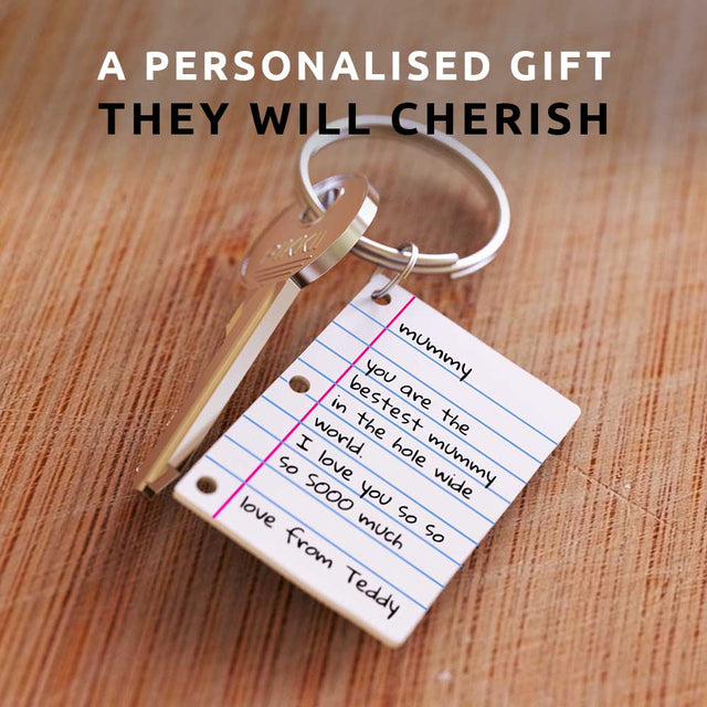 Pikkii Diy Shrink Little Lined Letter Keychain close up with Personalised message over wooden table with message a personalised gift they will cherish