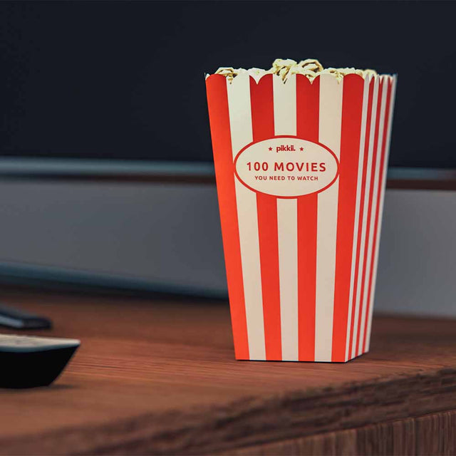 Movie Popcorn Bucket List on a coffee table