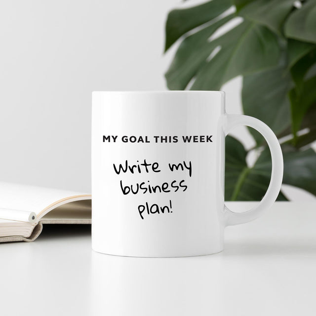Pikkii Motivational Goals Coffee Mug on a Desk