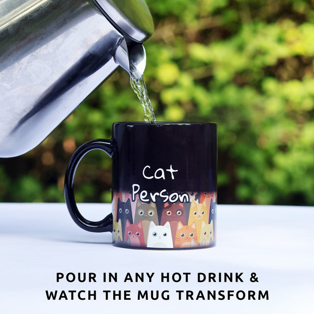 Crazy cat person mug by Pikkii transforming when pouring in a hot drink