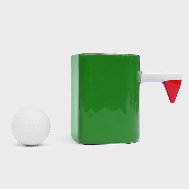 Golf mug and ball set by Pikkii on grey background