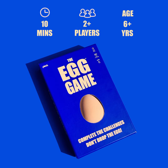The Egg Game by Pikkii Front of Packaging on Blue Background with Gameplay Icons - Suitable for 2 or more players, ages 6+, 10 minutes playtime