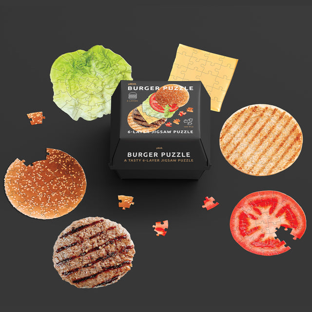 Burger 6 Layer Jigsaw Puzzle by Pikkii Packaging with Burger Bun, Meat, Cheese, Lettuce and Tomato Layers Surrounding Takeaway Style Box on Black Background
