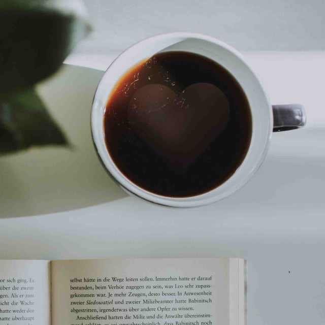Pikkii - Surprise Heart Mug - Reveals a Loving Surprise - Heart Showing In Coffee with Book