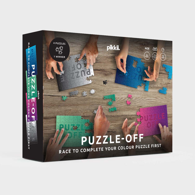 Pikkii's Puzzle off 4 Puzzles 1 winner fun games Front of Packaging over grey background