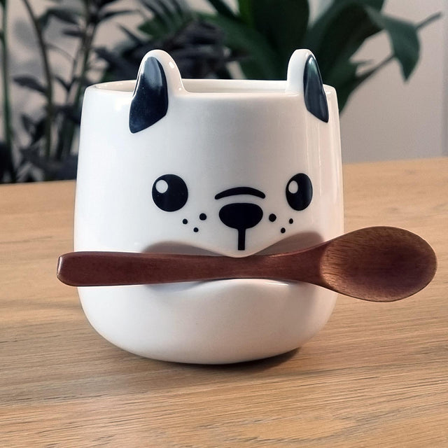 Pikkii Dog Shaped Mug Holding a Wooden Spoon in his Mouth Like A Stick