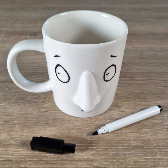 Suspicious looking face drawn onto the My Mood Today Coffee Mug