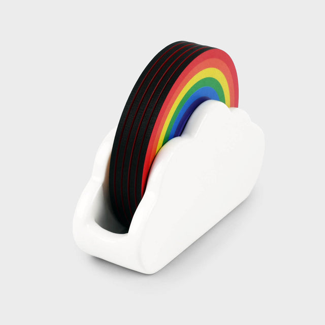 Wooden Rainbow Coasters nested in a white ceramic cloud holder
