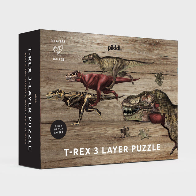 T-Rex Layer Jigsaw Puzzle by Pikkii - Front of Packaging on Grey Background