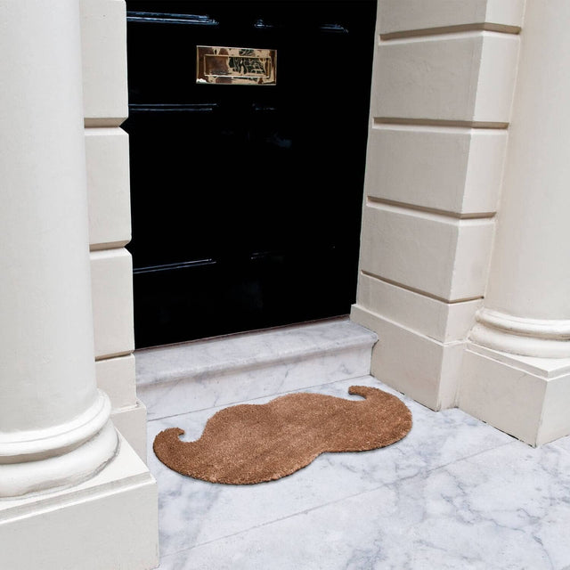 Pikki Moustage Doormat at an angle on doorstep of posh home