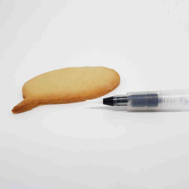 Food Colouring Pen next to Speech Bubble Cookie By Pikkii on white background